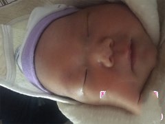 新生儿降临为万女士重新带来笑容
